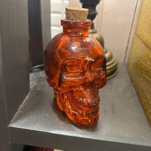 Red skull jar with cork stopper